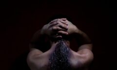 person with water on his face